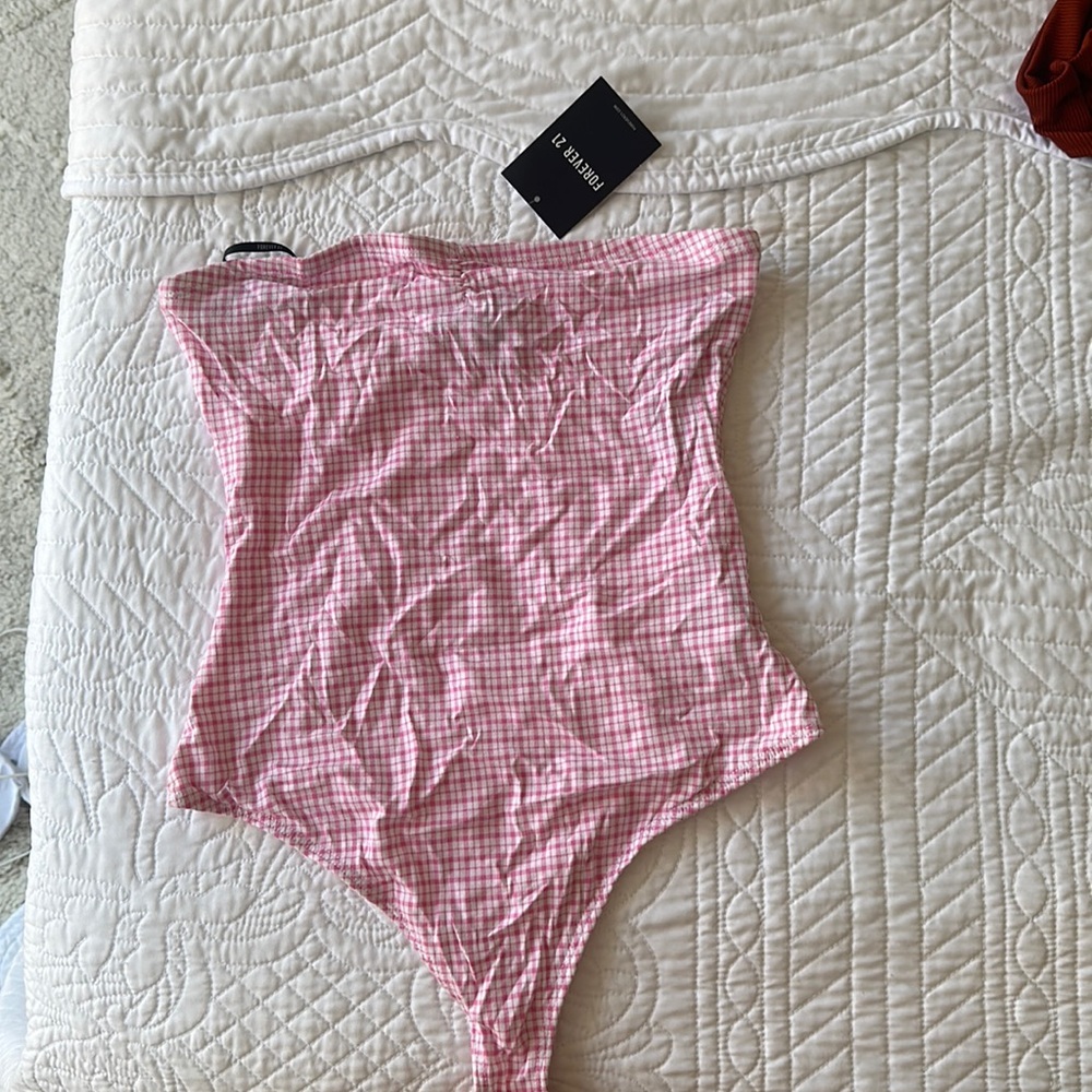 Pink and white strapless bodysuit. New/never worn